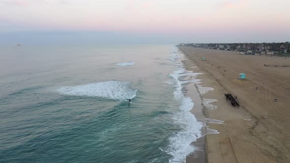 Surfing Towards The Sand