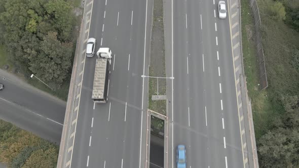 Drone View Of Busy M50 Motorway In Dublin, Ireland At Daytime. aerial tilt-up alt