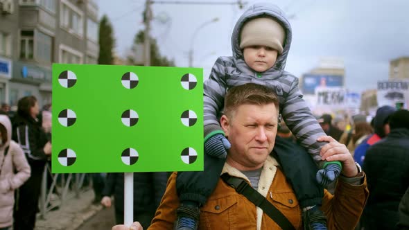 Sad Bitter Emotions Face Expressions of Dad and Son on Rally with Mockup Banner