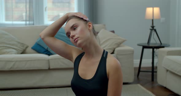 Close Up of a Young Girl Doing Yoga in Her Living Room. Healthy Lifestyle. Stretching, Leaning