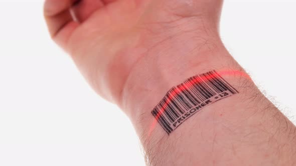 the Scanner Scans the Wrist of a Person with a Barcode Labeled Prisoner alt