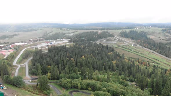 Sport training base for biathlon with shooting range and sport tracks. alt