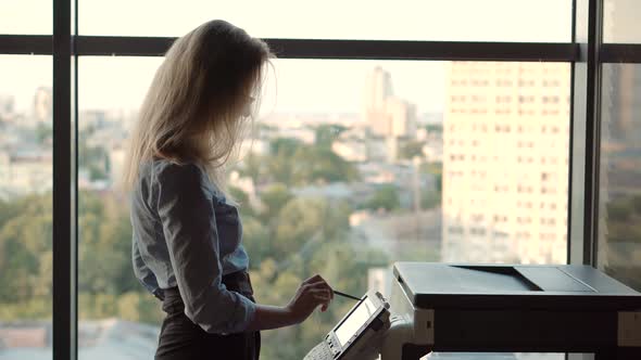 Secretary Sending Fax On Email And Printing Document.Businesswoman Using Printer In Office Or Copier alt