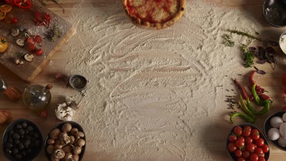 Hot Pizza on Kitchen Table Board alt
