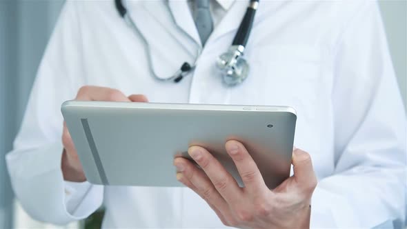 Doctor With Digital Tablet In Hands