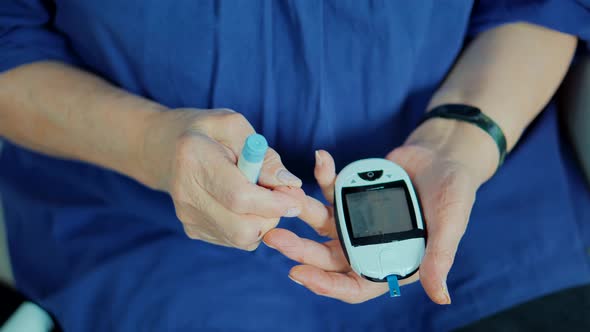 Measurement Sugar Level On Diabetes Test.Glucose Meter Measurement  Glucose Level. alt