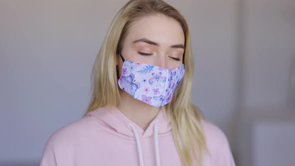 Blond Female in Face Mask alt