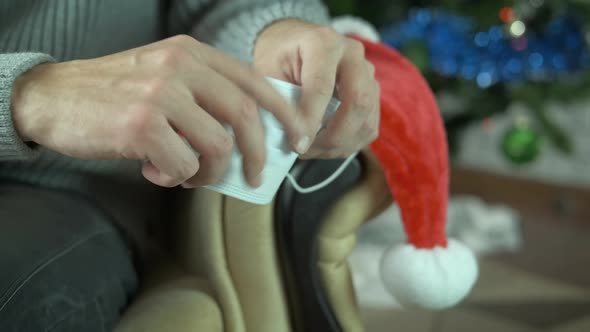 Quarantined Teen at Christmas with Coronavirus Mask alt