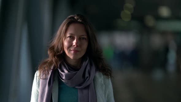 Female Portrait in Public Place, Near Enter in Underground or Shopping Mall