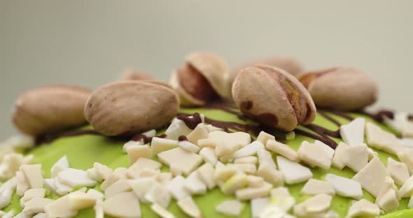 Easter Cakes Are Decorated With Pistachios And Green Icing. Sweet Dessert For The Holiday
