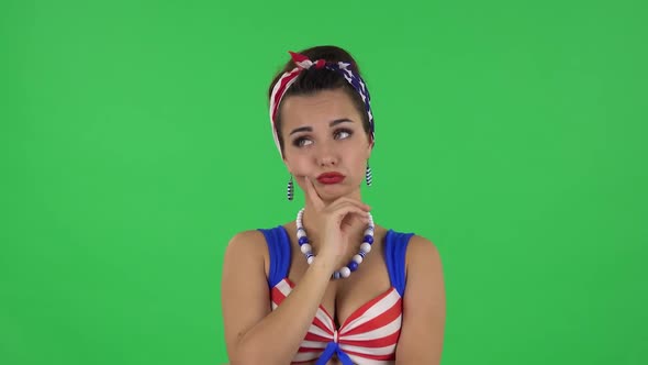 Portrait of Beautiful Girl in a Swimsuit Is Waiting with Boredom. Green Screen alt