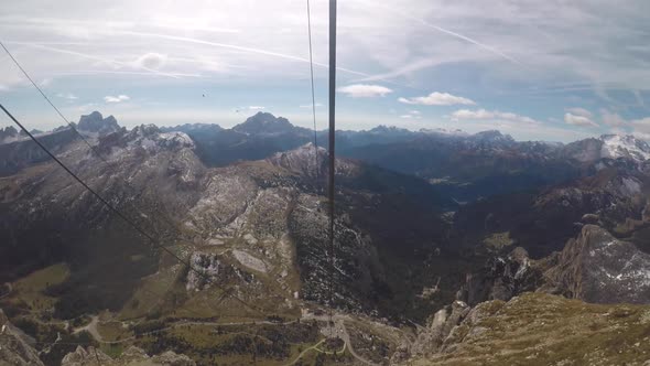 View from cable car ride on Dolomites mountains in Italy alt