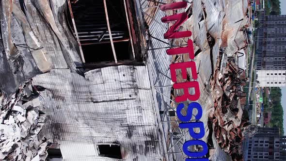 Vertical Video of the Consequences of the War in Ukraine  a Bombedout Shopping Center alt