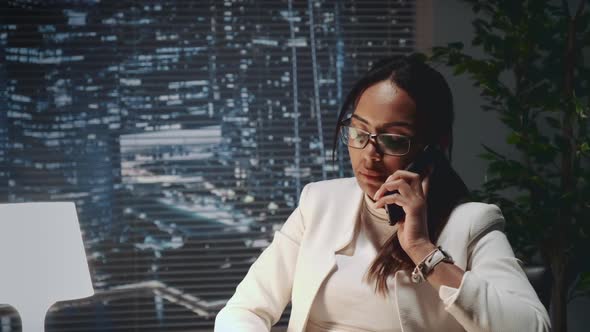 Close Up of Multiracial Business Lady Speaking By Smartphone alt