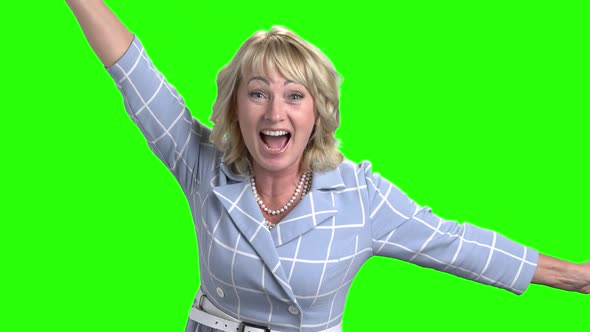 Excited Mature Woman on Green Screen alt