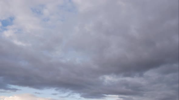 Timelapse Sky and Black Cloud. Dark Grey Storm Clouds. Dramatic Sky. Lighting in Dark Stormy Cloudy