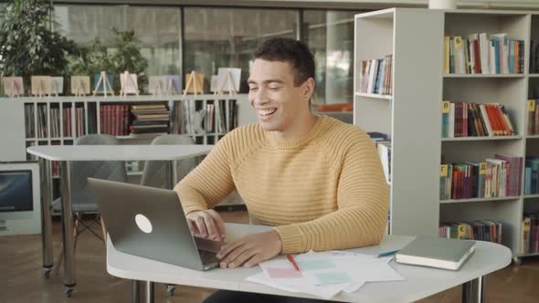 Happy Man Executive Waving Hand Using Laptop Computer Having Video Conference Call Virtual Meeting alt