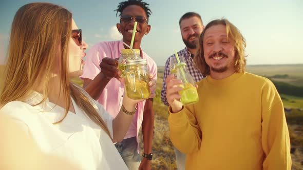 Woman Takes Video of Herself and Her International Friends on Front Camera They Have Alcoholic alt