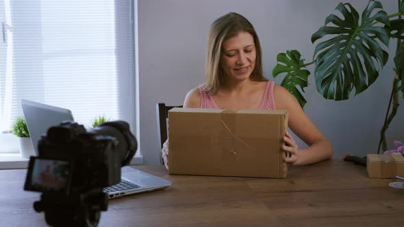 Young Beautiful Woman Leads Her Video Blog From Home