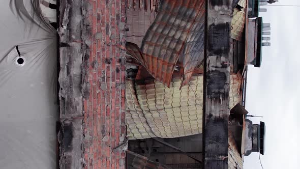 Vertical Video of a Wartorn Building in Ukraine alt