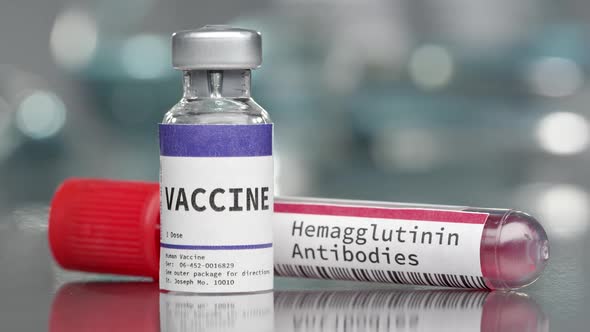 Vaccine and hemagglutinin antibodies vial in medical lab alt