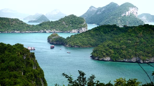 Timelapse of Water Flows Between Islands Full of Green Trees in Thailand alt