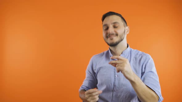 Young Man in Shirt Slow Dancing. Smiling Man Dancing Concept alt