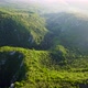 Aerial view of karst landscape, with valleys and cliffs, at sunset - VideoHive Item for Sale