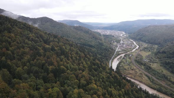 Aerial View of the Village in the Carpathian Mountains in Autumn. Ukraine alt
