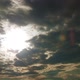 The Sun&#39;s Rays Break Through Dense Gray Cumulus Clouds Time Lapse - VideoHive Item for Sale