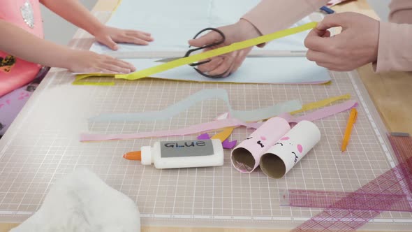 Step by step. Making unicorns out of paper and empty toilet paper rolls. alt