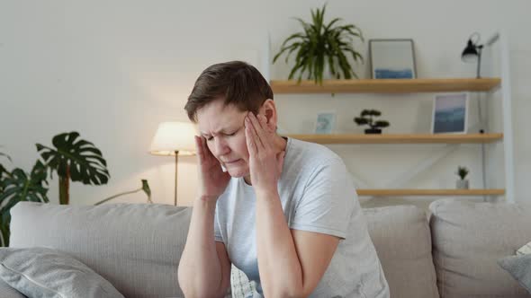 Tired Stressed Mature Woman Suffering From Chronic Headache Burnout Stress Feeling Migraine Pain alt
