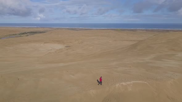 Walking on sand dunes in New Zealand