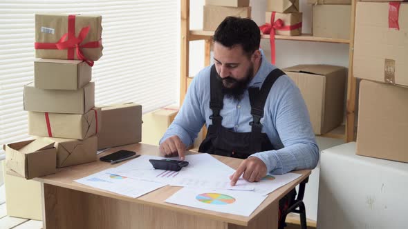 Startup and Sme Concept Indian Small Business Owner 30s Working with Creative Design and Project alt