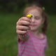 Little Girl is Sniffing Flowers - VideoHive Item for Sale