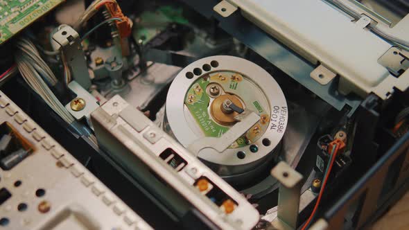 Video Cassette is Loaded in the VCR Magnetic Videotape in the VCR Mechanism alt