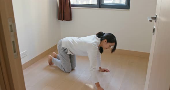 Housewife clean the floor alt