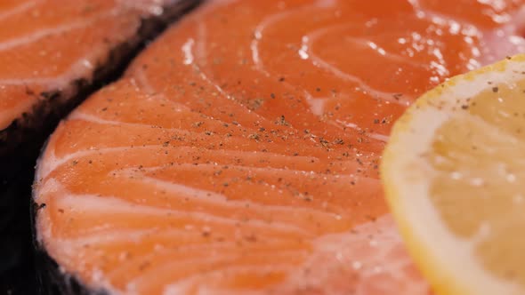 Fresh Red Salmon Texture. Closeup, Close Up Macro Fish Steak with Lemon and Spices alt