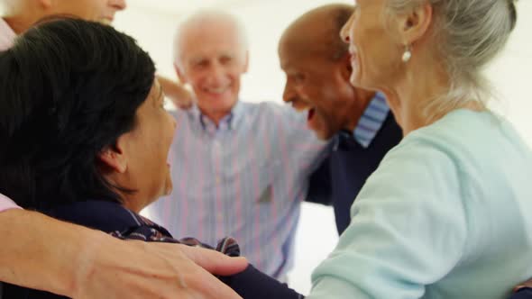 Group of people forming huddles 4k alt