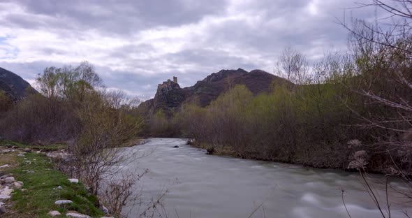 Time lapse shot of Drisi Castle situated on a mountain above the Tedzami River gorge. Georgia 2022 alt