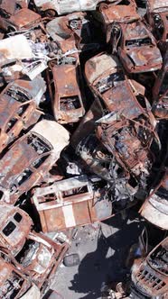 Vertical Video of Wardestroyed Cars in Ukraine alt