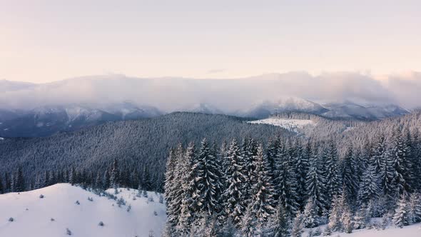 Beautiful Cinematic Winter season  Landscape of Snowy mountain. Aerial view alt