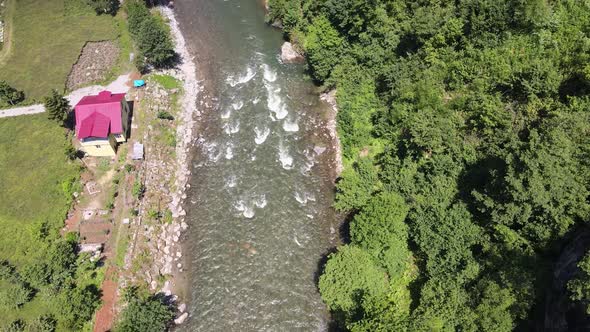 Drone flies above the river