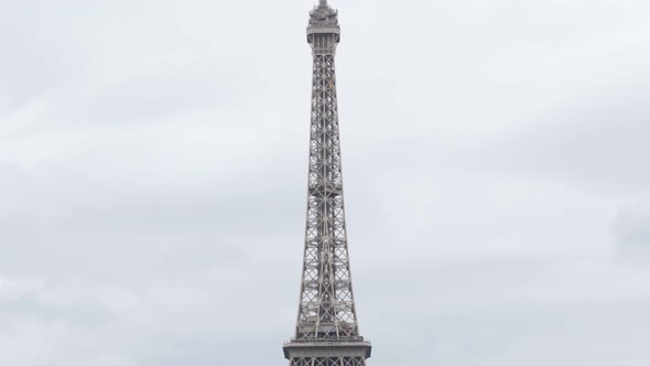 The Eiffel Tower made of iron famous French architecture  monument  slow tilt 4K 2160p 30fps UltraHD alt