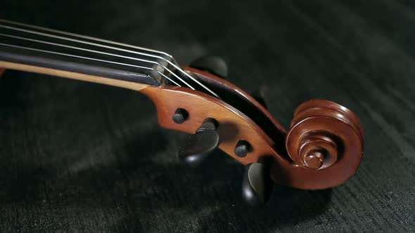 Part of Aged Violin On Black Background