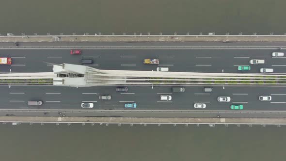 Bridge in Guangzhou City and Car Traffic. Guangdong, China. Aerial Vertical Top-Down View alt