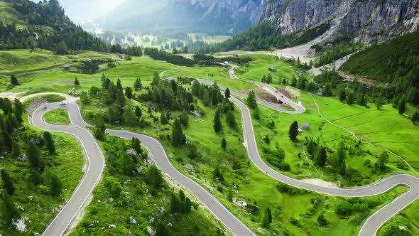 Awesome winding road at Passo Gardena, Dolomites, aerial view alt