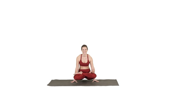 Young sporty woman practicing yoga doing Scale exercise, alt