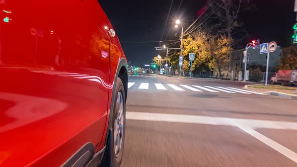 Drivelapse From Side of Car Moving on a Night Avenue in City Timelapse Hyperlapse alt