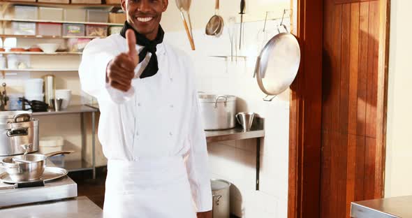 Portrait of chef showing thumbs up alt